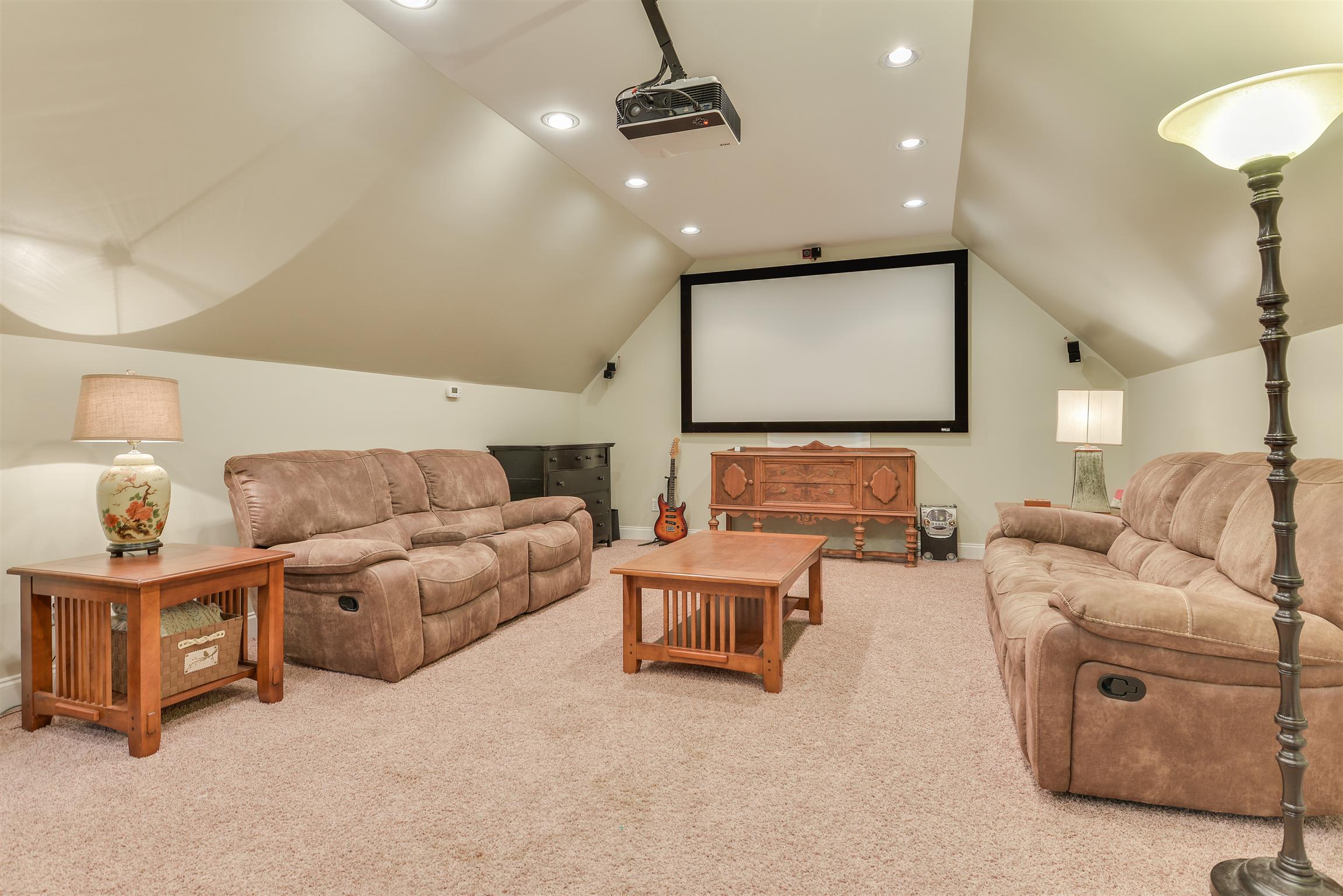 3129 Belotes Ferry Road Lebanon, TN 37087 - Photo 25 of 29 a living room with furniture and a flat screen tv