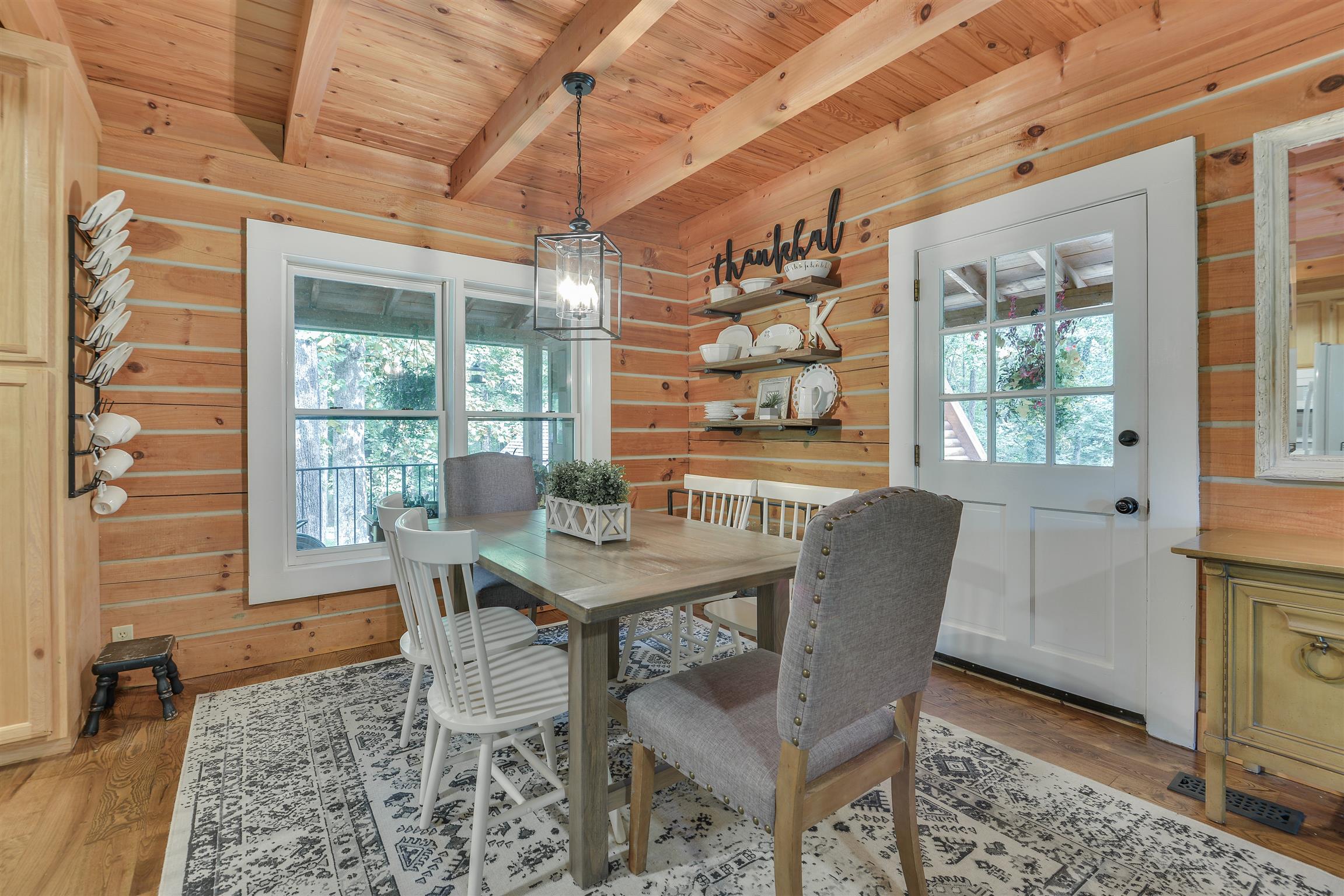 3129 Belotes Ferry Road Lebanon, TN 37087 - Photo 7 of 29 a view of a dining room with furniture wooden floor and a chandelier