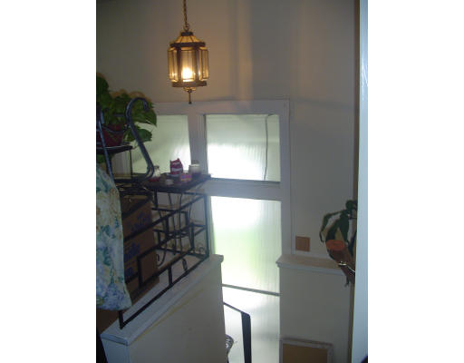 10 Stonehill Road Boston, MA 02136 - Photo 3 of 8 a view of a hallway with windows