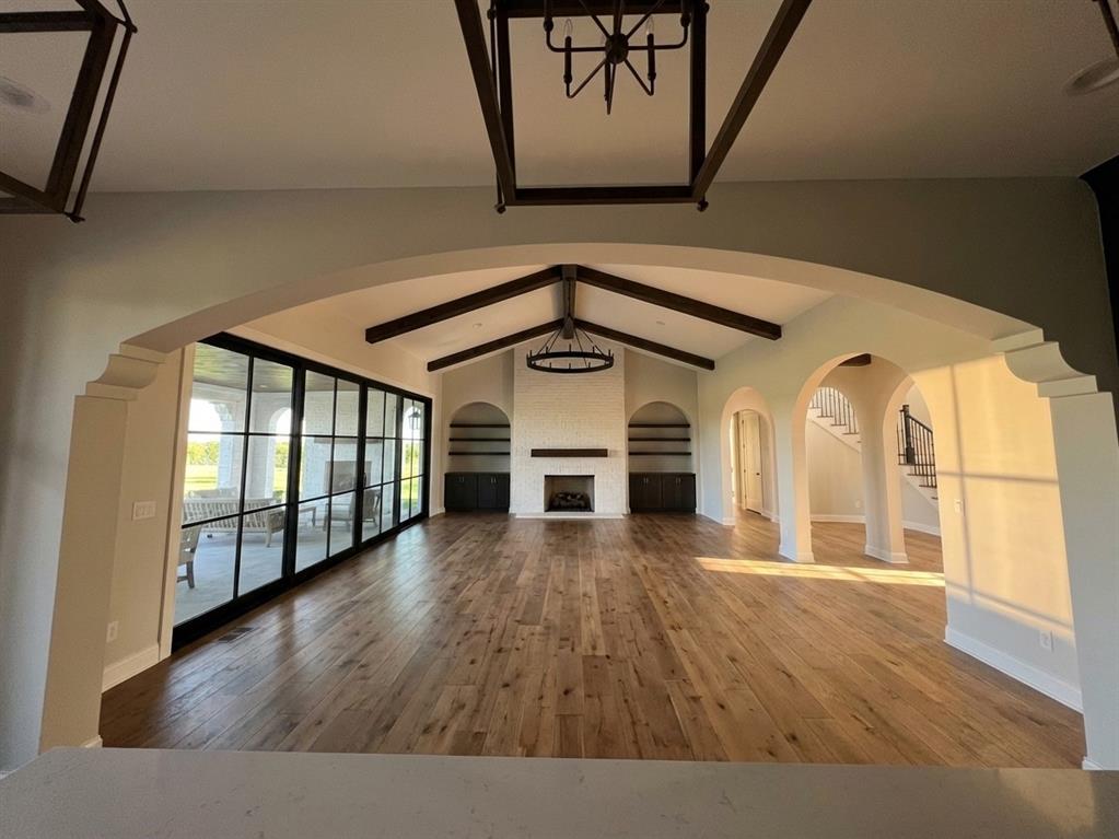 408 Manza Court Aledo, TX 76008 - Photo 3 of 14 a view of gallery with wooden floor
