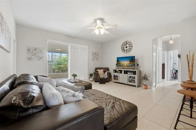 a bedroom with a bed and a table