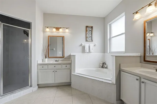 a view of a house with yard and a garden