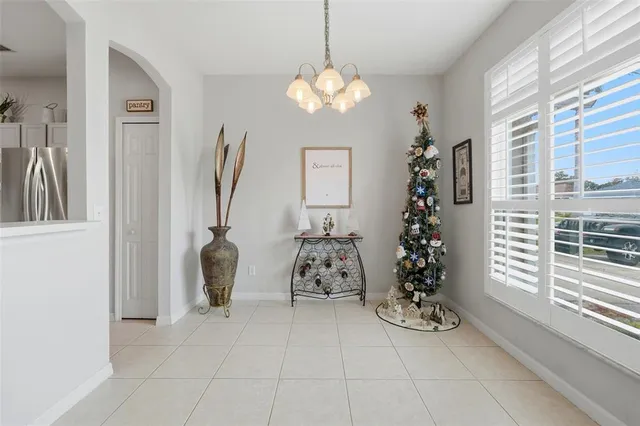 a kitchen with a stove a sink and a refrigerator