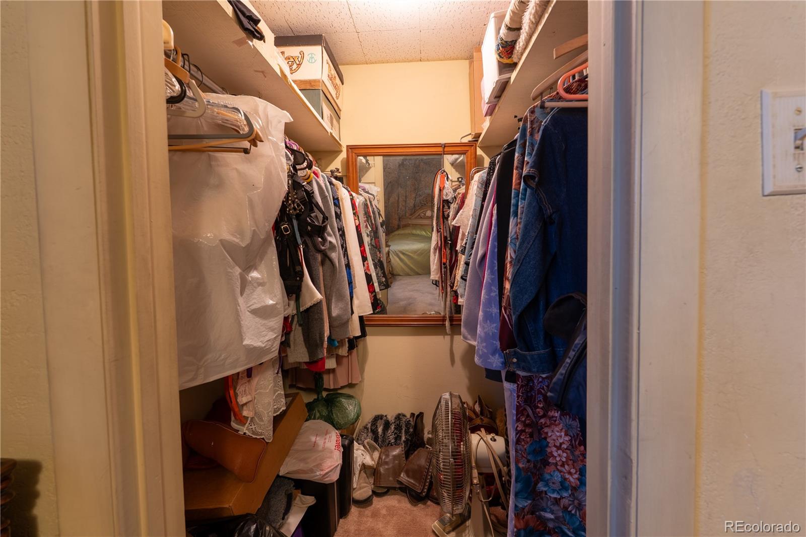 12169 East Baseline Road Lafayette, CO 80026 - Photo 15 of 39 a view of walk in closet with clothes