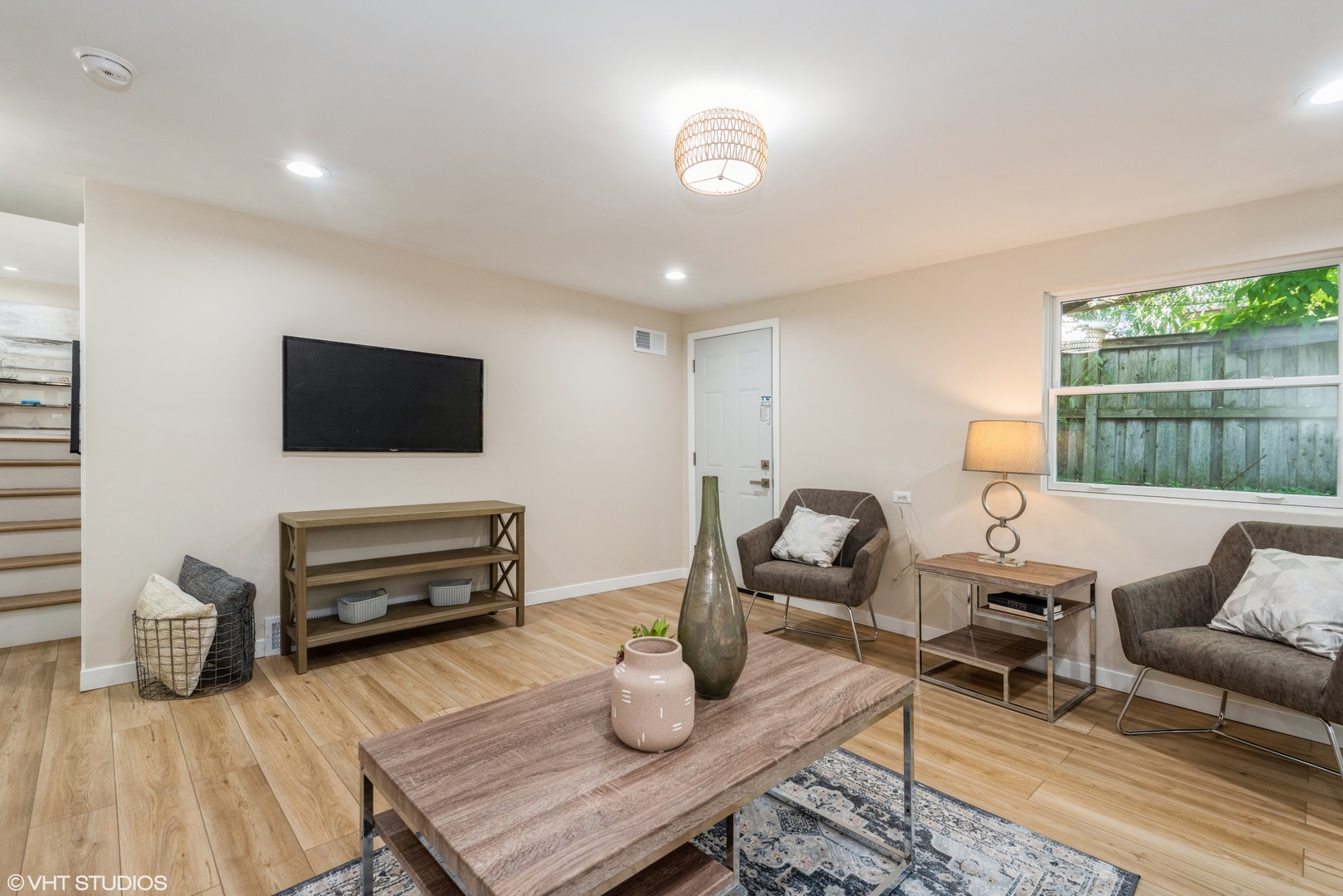 725 Locust Road Wilmette, IL 60091 - Photo 10 of 20 a living room with furniture and a flat screen tv