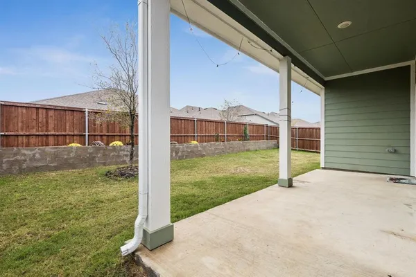 a view of a backyard with a garden