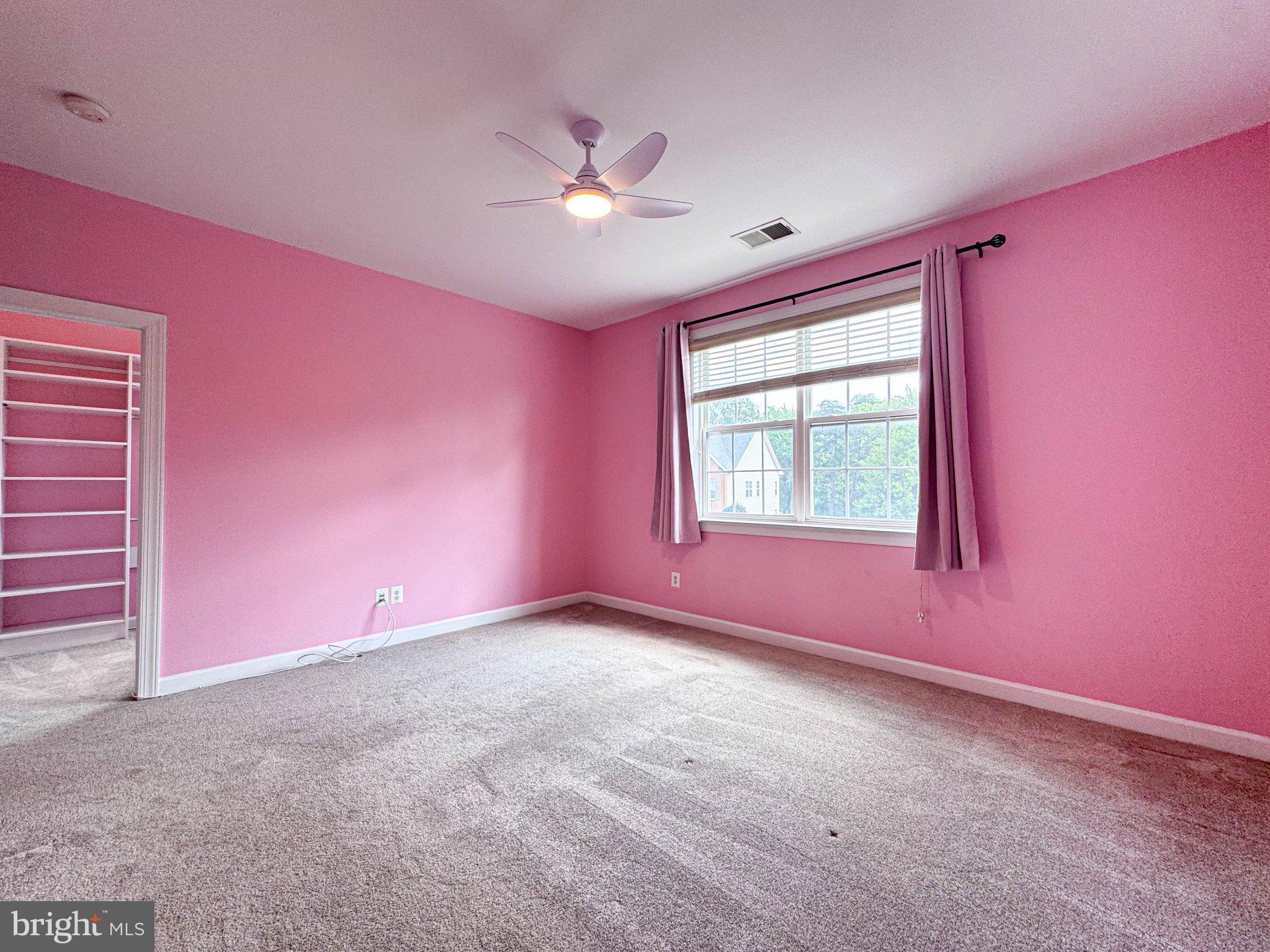 22827 Oakgrove Road Sterling, VA 20166 - Photo 26 of 56 Charming pink-hued bedroom retreat.