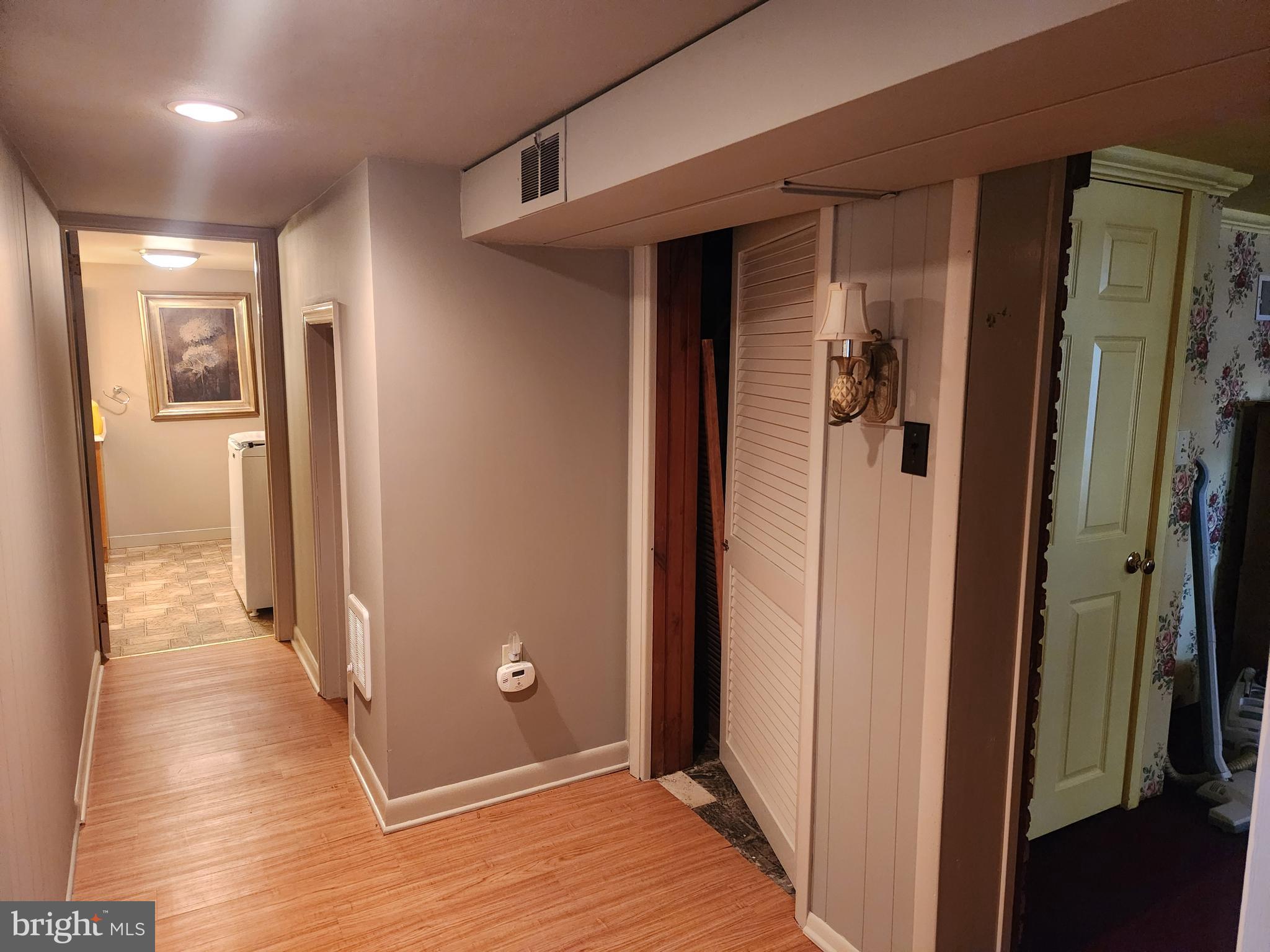 444 Donegal Springs Road Mount Joy, PA 17552 - Photo 26 of 29 a view of a hallway with wooden floor