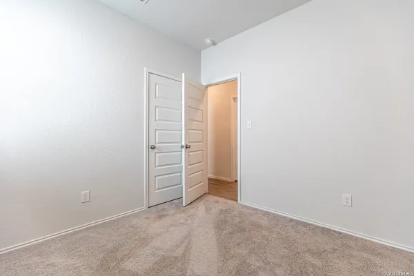 a view of room with walk in closet