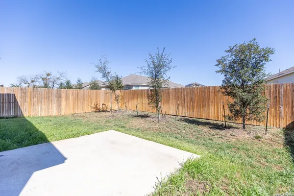 a view of a backyard with a garden