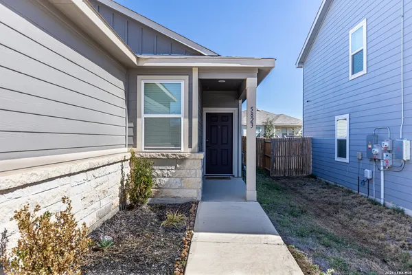 a front view of a house with a porch