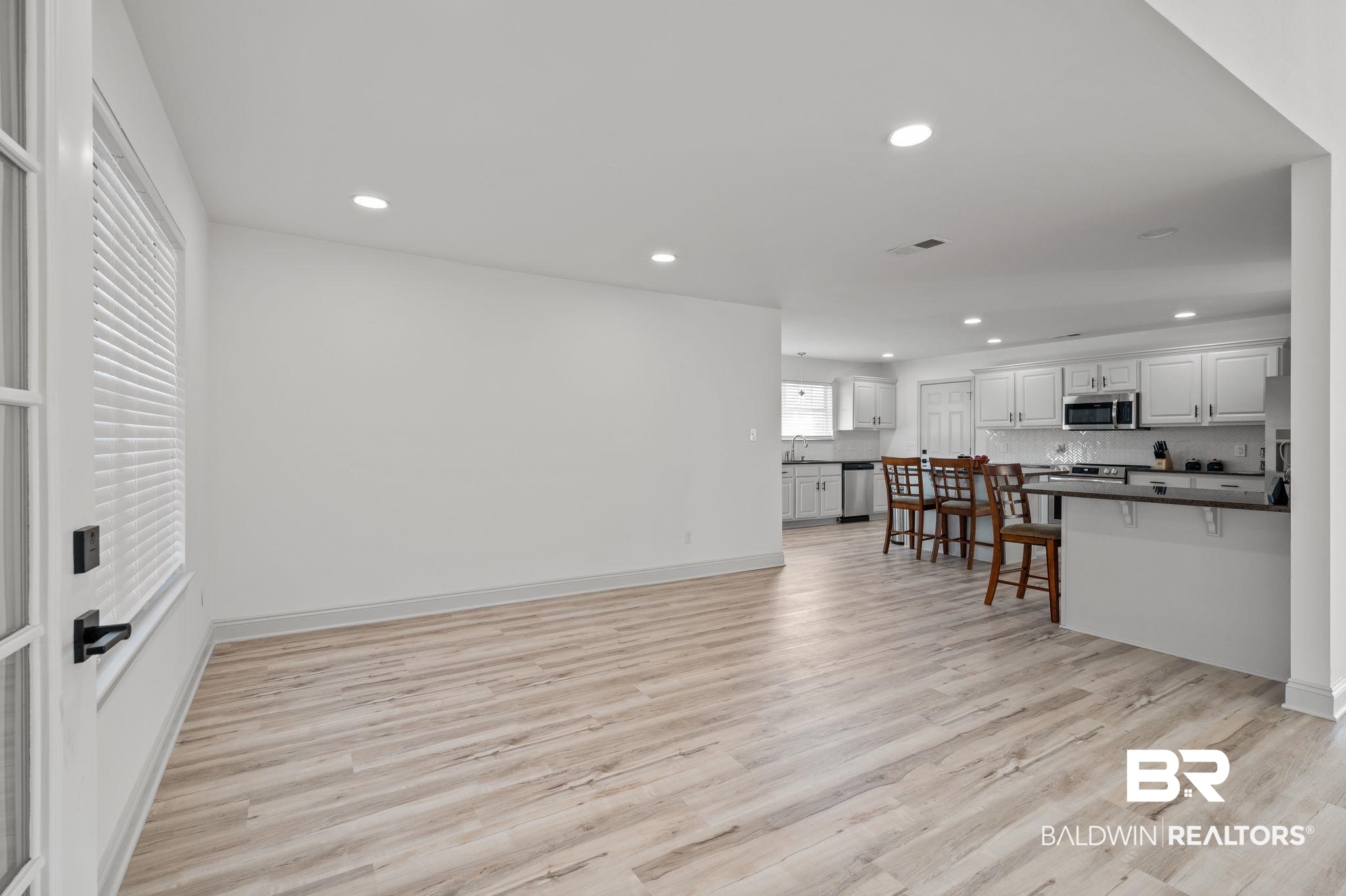 136 Destrehan Road Fairhope, AL 36532 - Photo 11 of 44 Living room featuring light hardwood / wood-style flooring