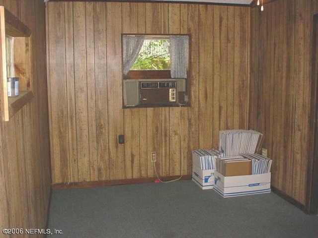 4824 Manchester Road Jacksonville, FL 32210 - Photo 8 of 10 a view of an empty room with a window