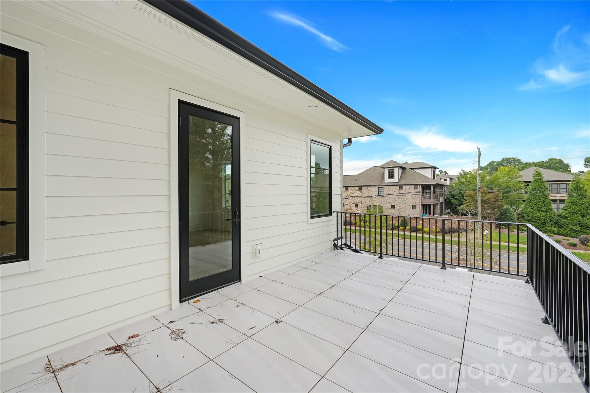 5035 Gilchrist Road, Unit 1B Charlotte, NC 28211 - Photo 36 of 46 a view of a terrace