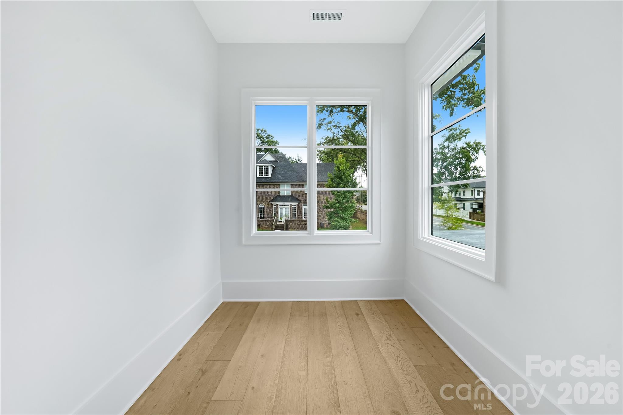 5035 Gilchrist Road, Unit 1B Charlotte, NC 28211 - Photo 42 of 46 an empty room with a window