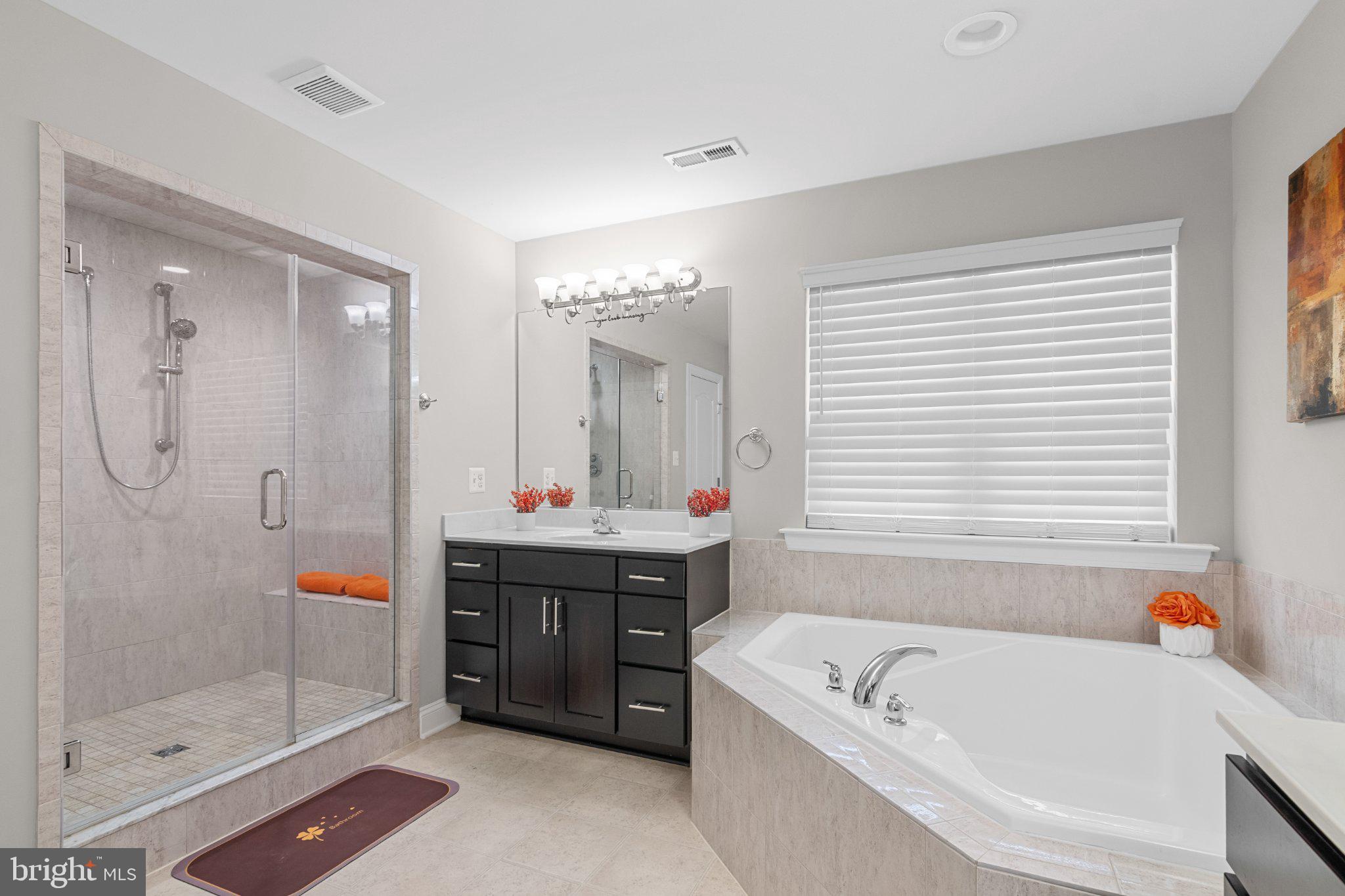 4554 Coachmans Path Court Waldorf, MD 20601 - Photo 20 of 40 Modern bathroom with elegant fixtures.