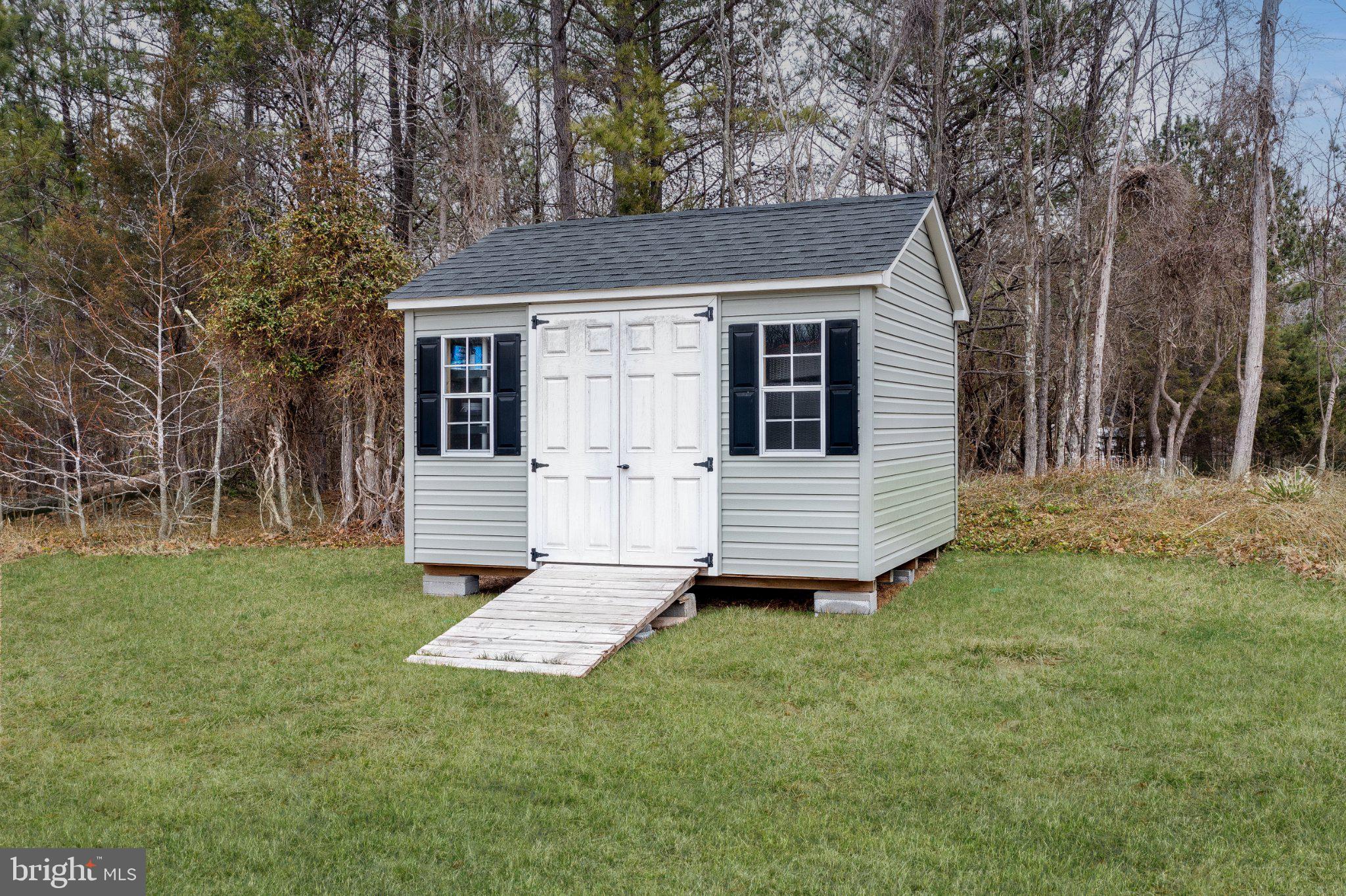 4554 Coachmans Path Court Waldorf, MD 20601 - Photo 36 of 40 Charming garden shed in serene setting.