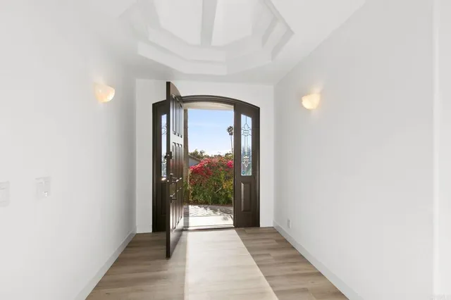 a view of walk in closet and bedroom view