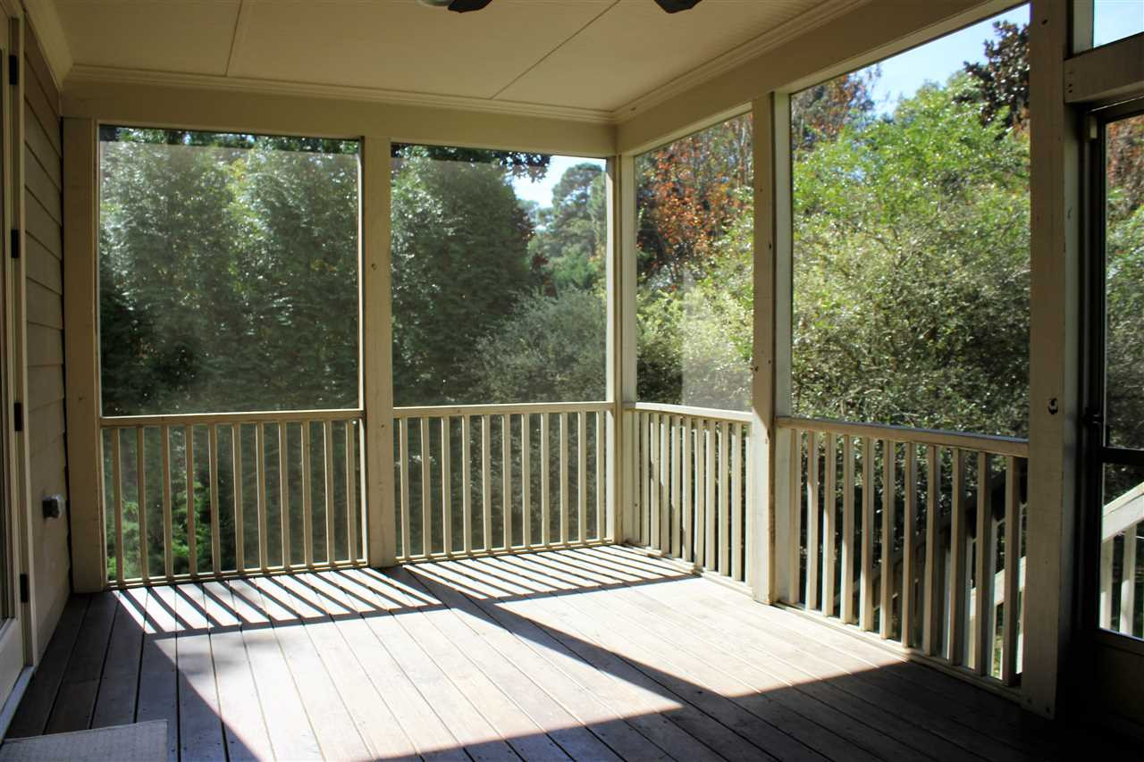 8500 Briarthorne Place Raleigh, NC 27613 - Photo 27 of 30 Screened Porch Overlooks Back Yard