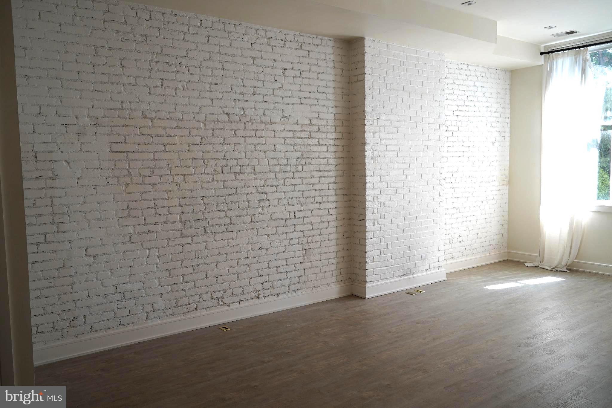 725 Euclid Street Northwest, Unit 2 Washington, DC 20001 - Photo 3 of 14 a view of an empty room