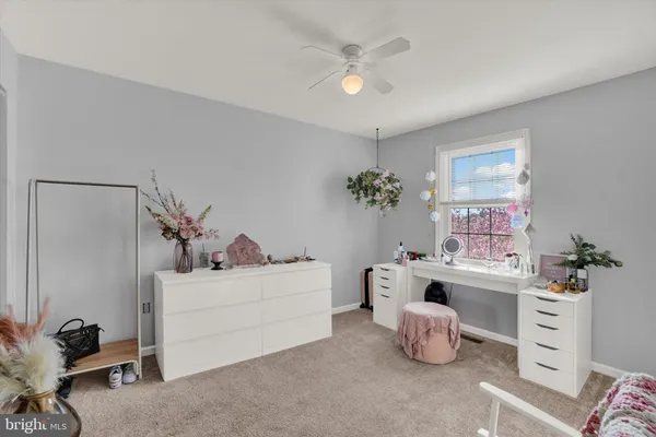 a living room with furniture and decor