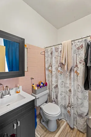 a kitchen with stainless steel appliances granite countertop a refrigerator and a refrigerator