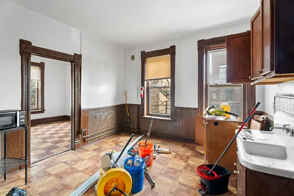 a bedroom with a bed and a walk in closet