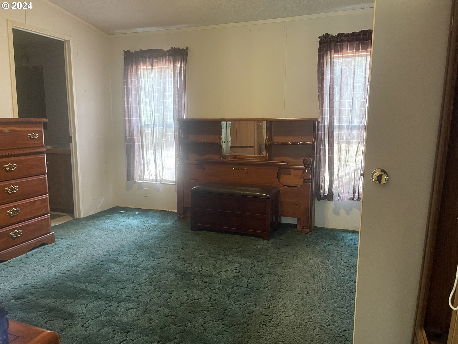 8295 King Road Grand Ronde, OR 97347 - Photo 21 of 32 a living room with furniture and a fireplace