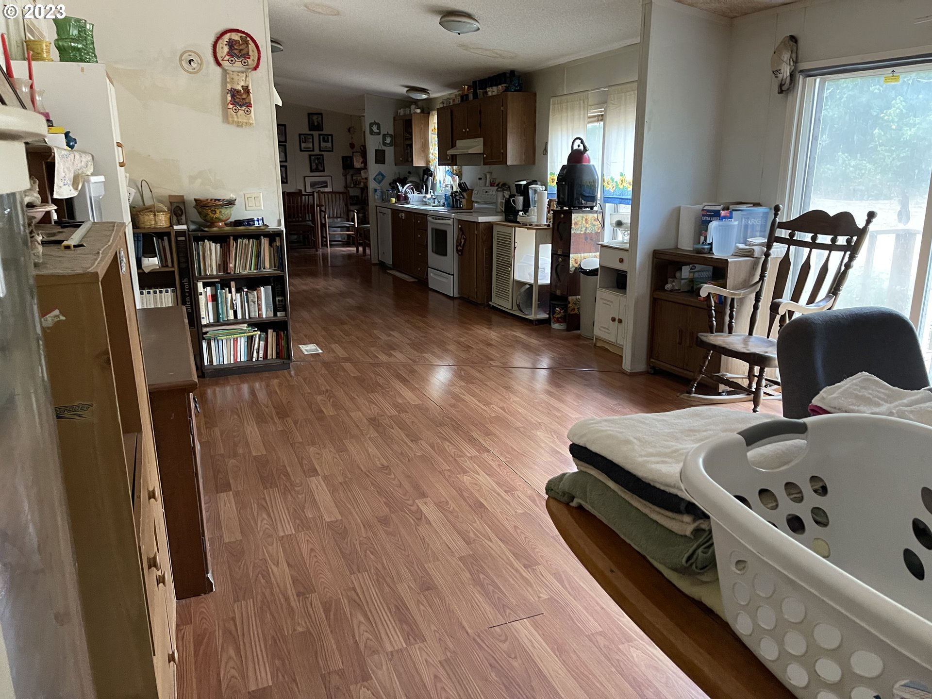 8295 King Road Grand Ronde, OR 97347 - Photo 7 of 32 a living room with furniture and a wooden floor