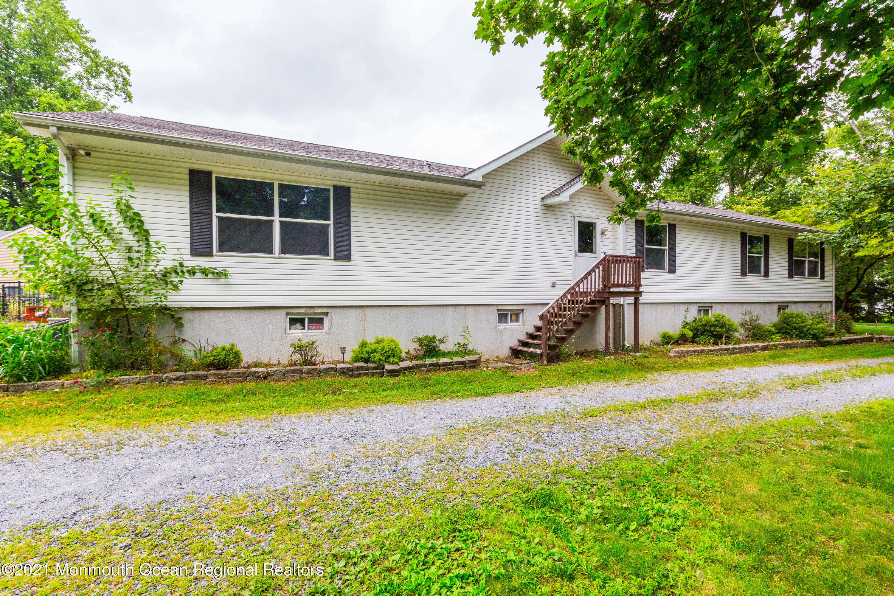 544 Brickyard Road Freehold, NJ 07728 - Photo 1 of 24 a house view with a outdoor space