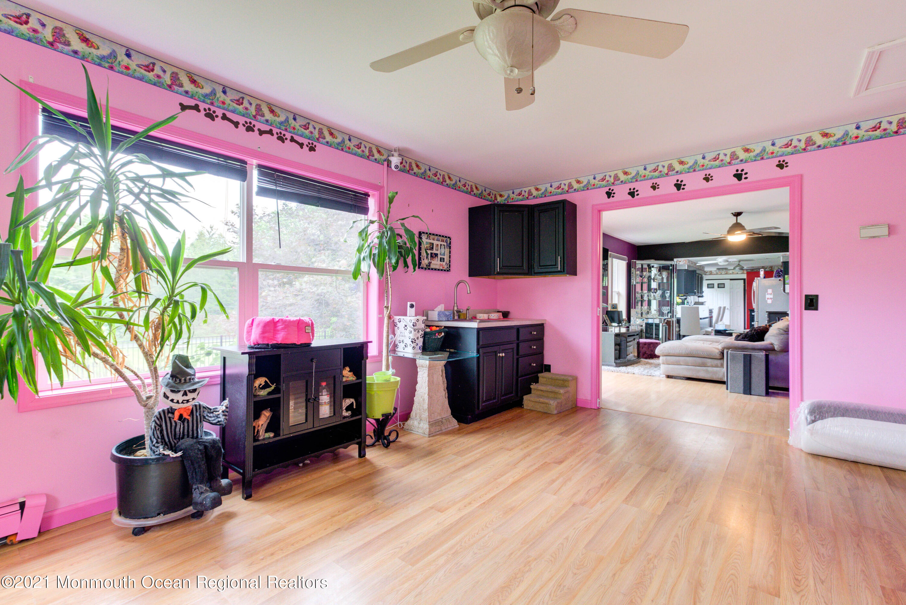 544 Brickyard Road Freehold, NJ 07728 - Photo 11 of 24 a living room with furniture and a fireplace