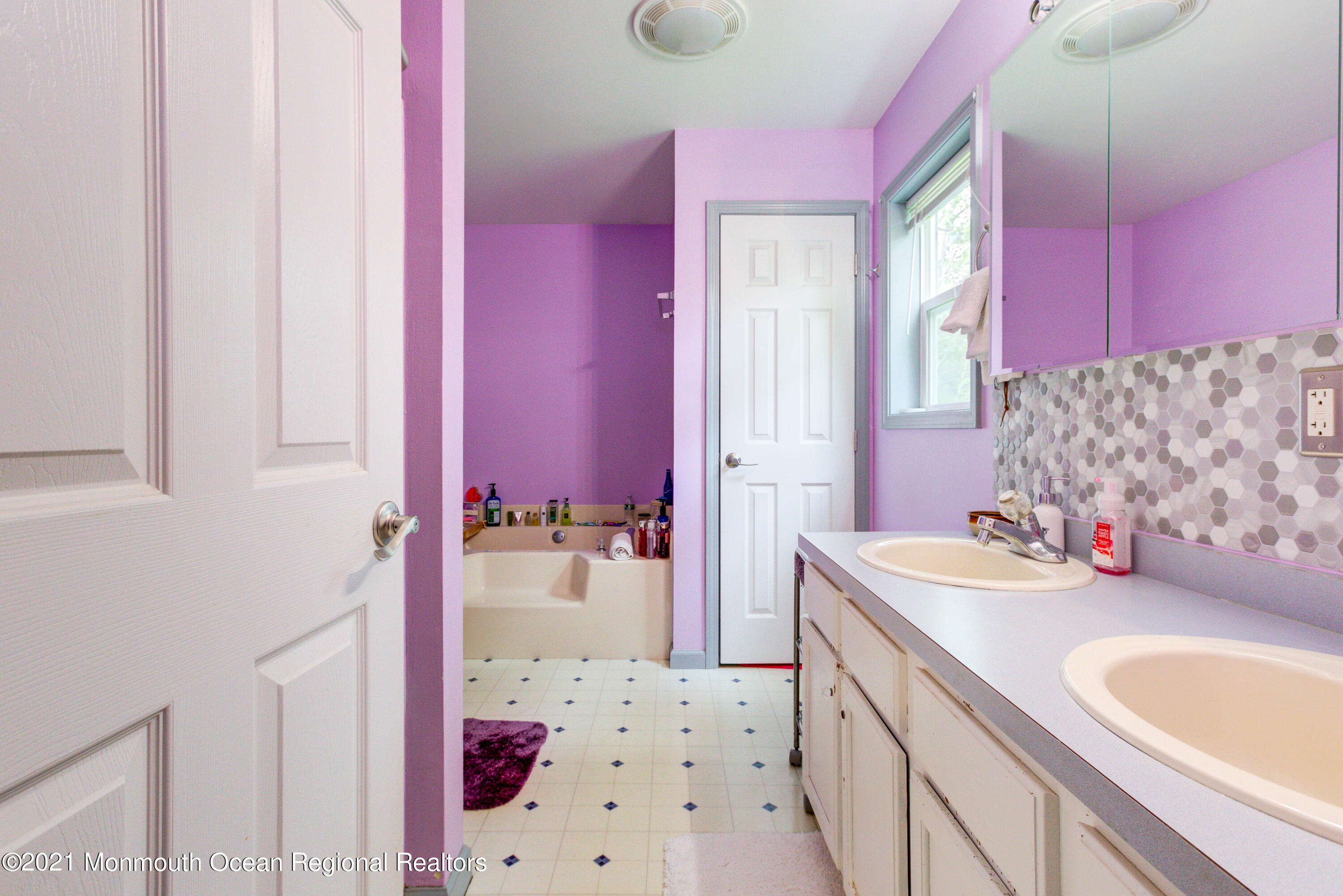 544 Brickyard Road Freehold, NJ 07728 - Photo 16 of 24 a bathroom with a sink vanity tub and shower