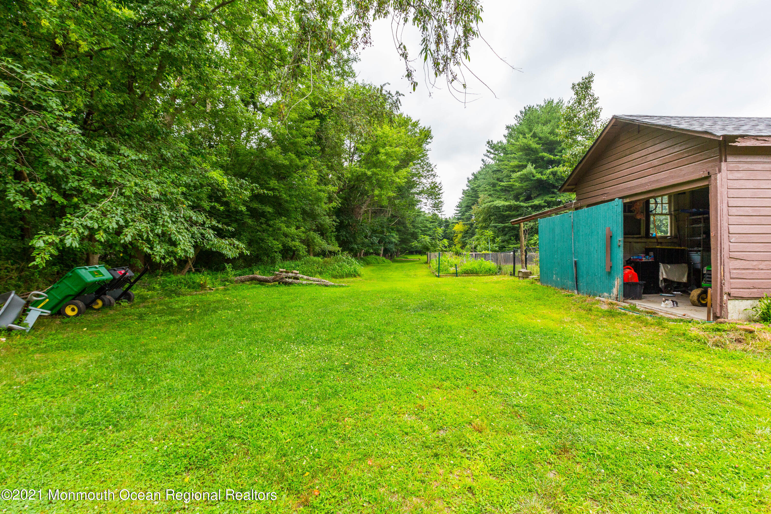 544 Brickyard Road Freehold, NJ 07728 - Photo 23 of 24 a view of a house with backyard
