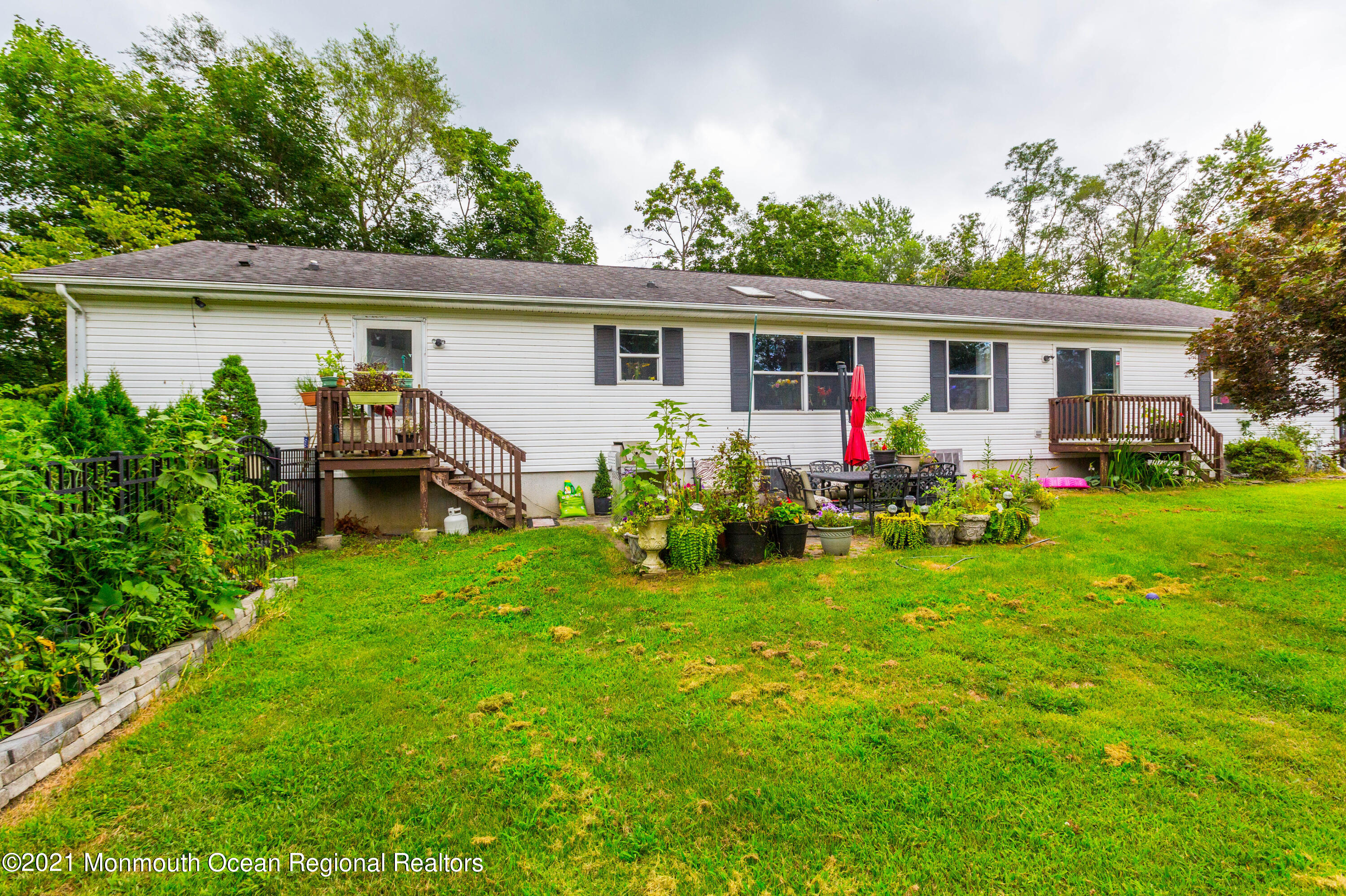 544 Brickyard Road Freehold, NJ 07728 - Photo 24 of 24 a front view of house with yard and green space
