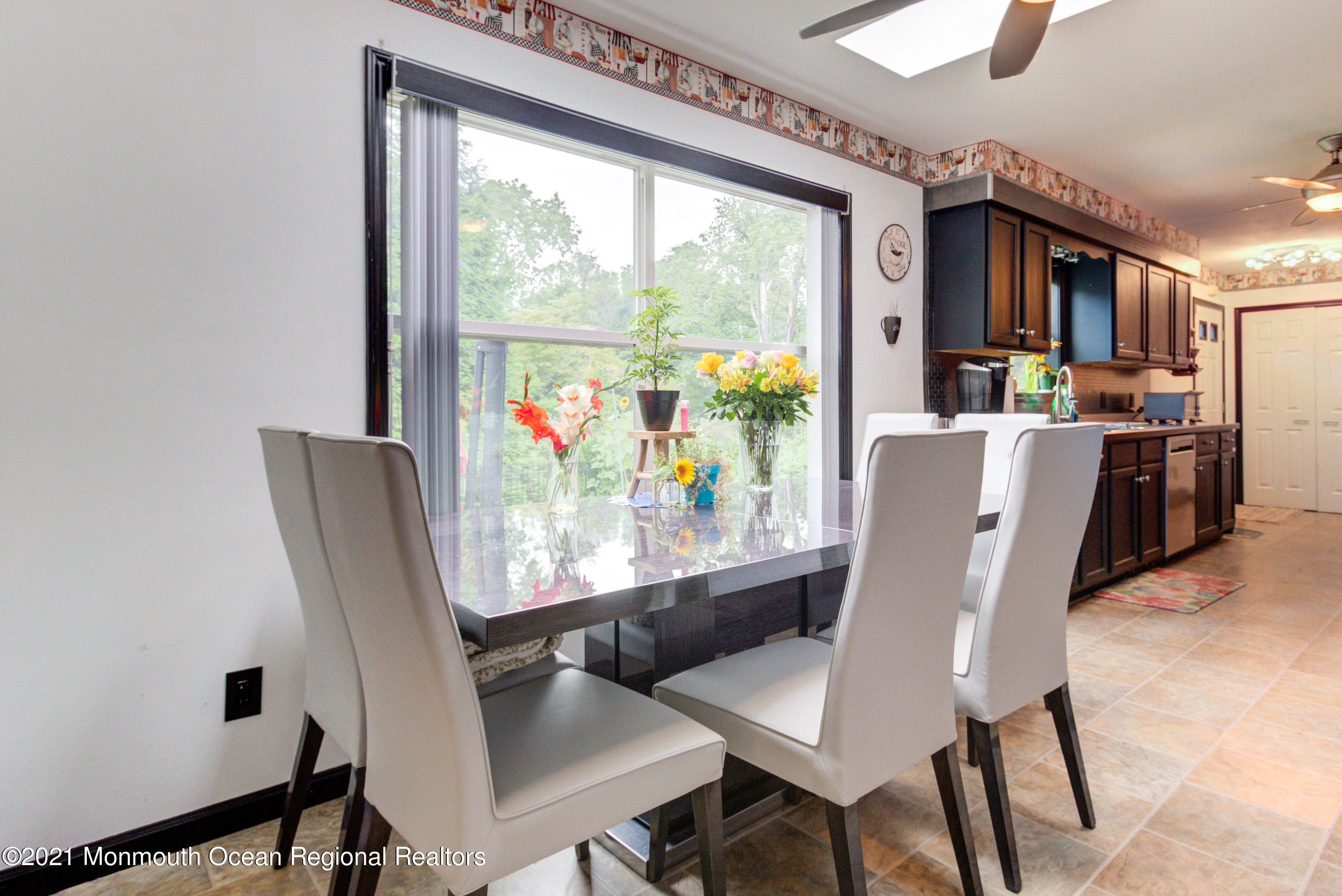 544 Brickyard Road Freehold, NJ 07728 - Photo 6 of 24 a view of a dining room with furniture window and outside view