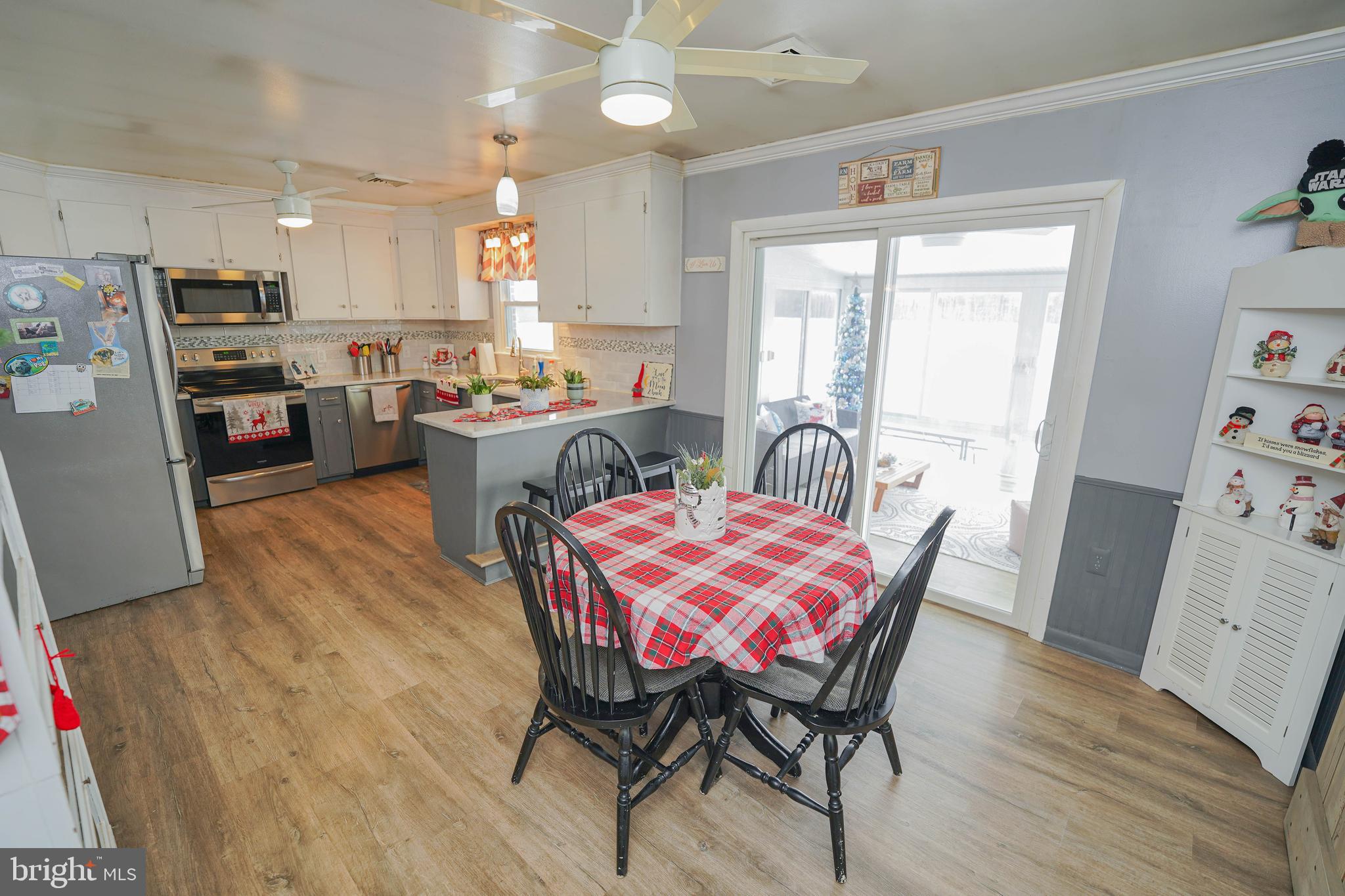 5627 Galestown Reliance Road Rhodesdale, MD 21659 - Photo 17 of 48 a view of a dining room with furniture and wooden floor