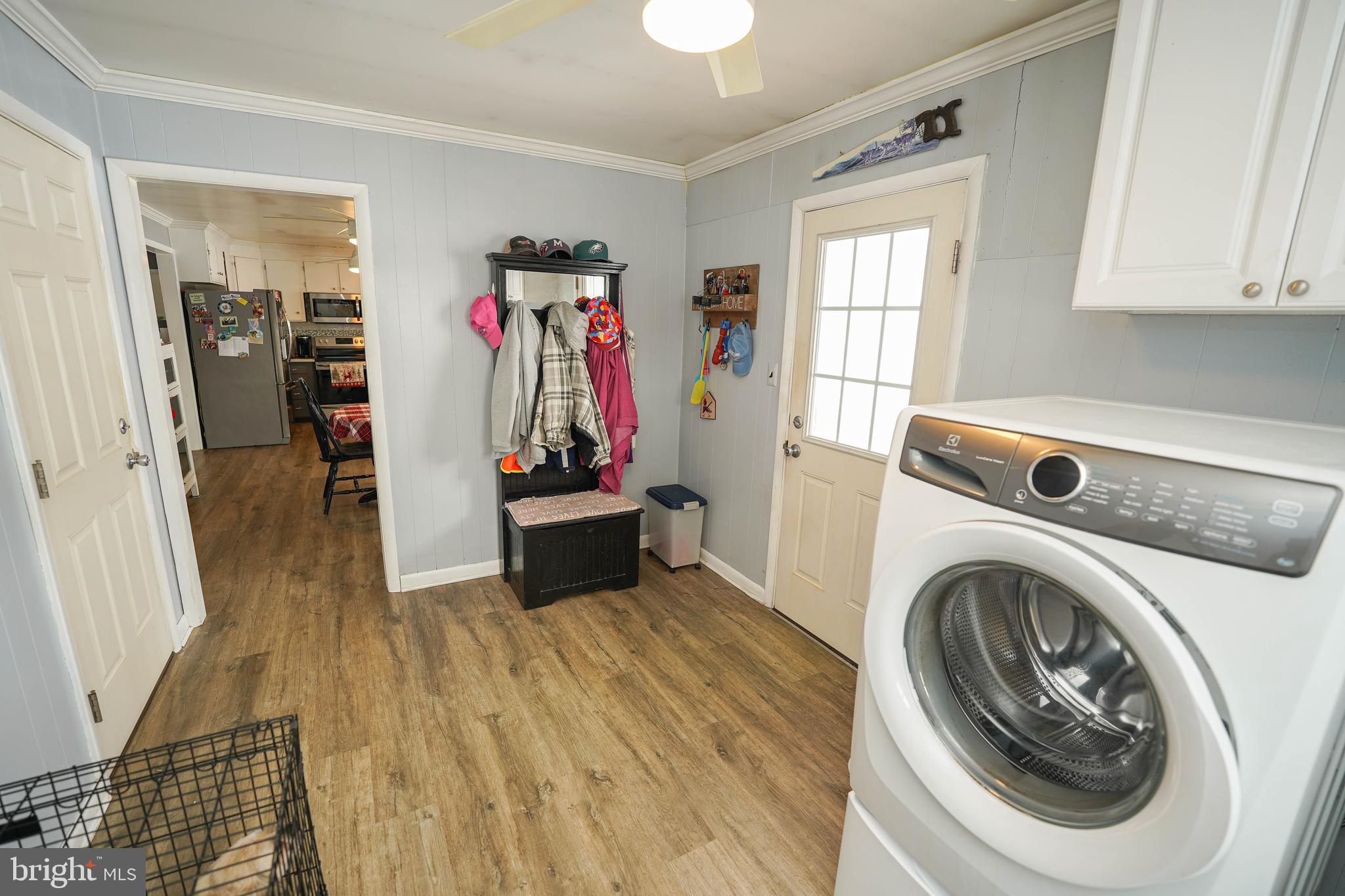 5627 Galestown Reliance Road Rhodesdale, MD 21659 - Photo 22 of 48 a view of a storage and utility room with washer and dryer