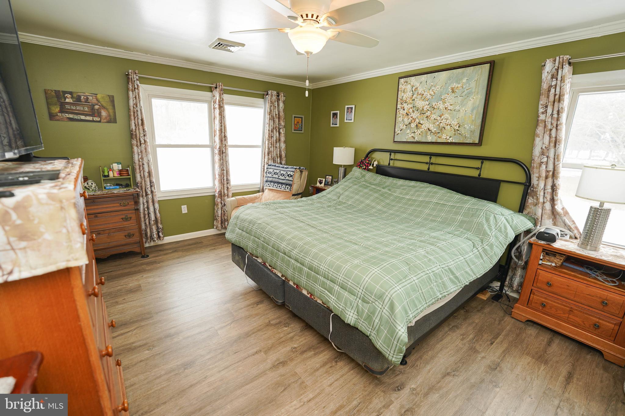 5627 Galestown Reliance Road Rhodesdale, MD 21659 - Photo 29 of 48 a bedroom with a bed and window