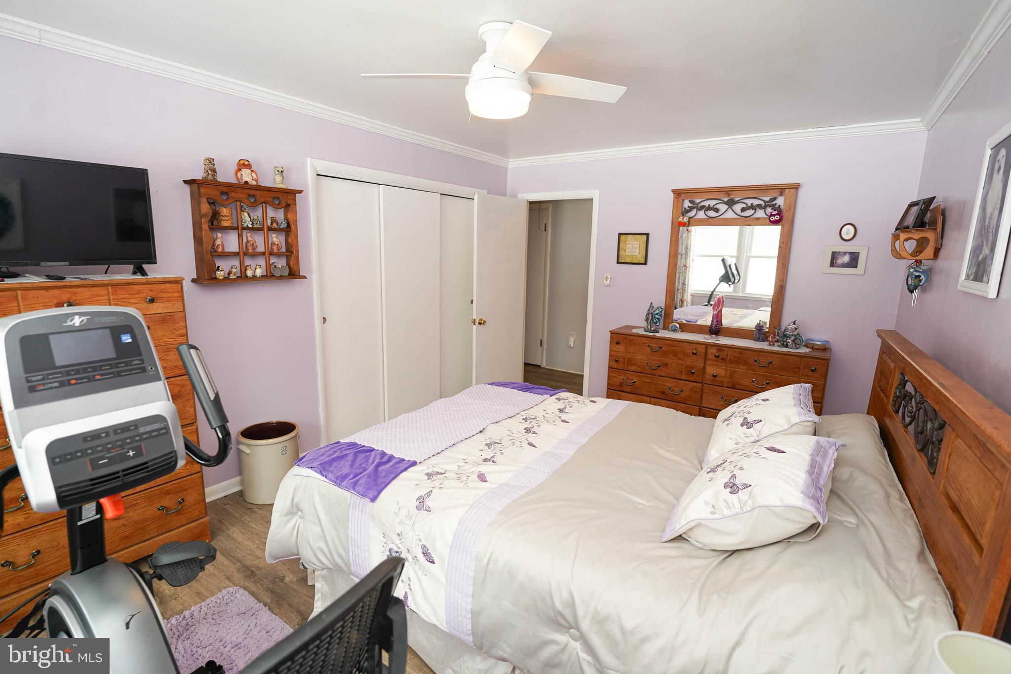 5627 Galestown Reliance Road Rhodesdale, MD 21659 - Photo 39 of 48 a bedroom with a bed and a flat screen tv