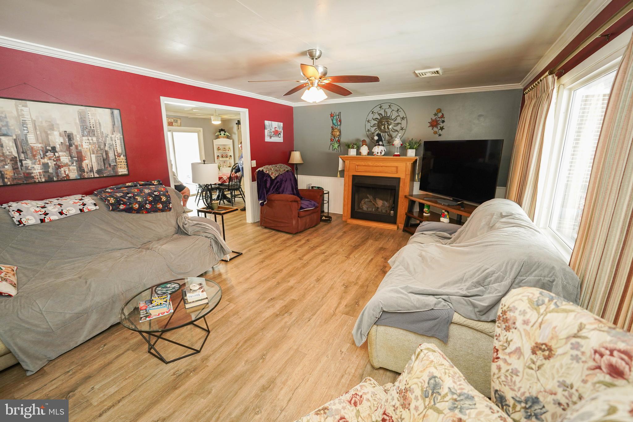 5627 Galestown Reliance Road Rhodesdale, MD 21659 - Photo 5 of 48 a living room with furniture and a flat screen tv