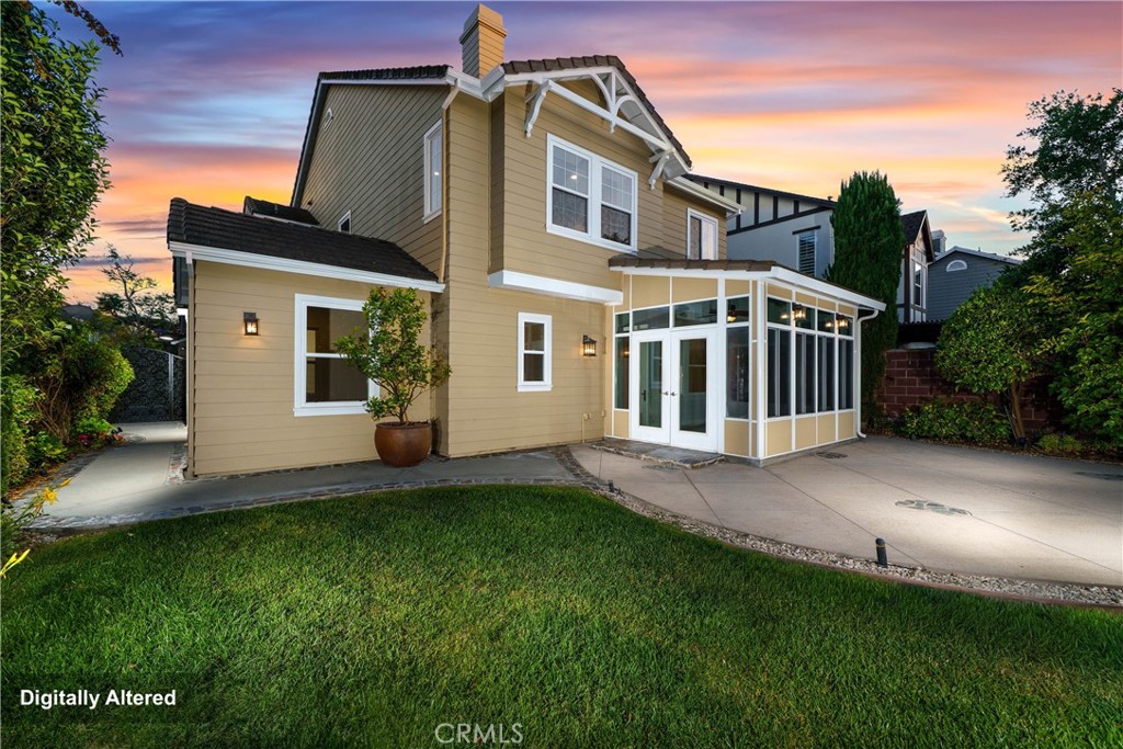 15 Plum Street Ladera Ranch, CA 92694 - Photo 109 of 113 a front view of a house with a garden