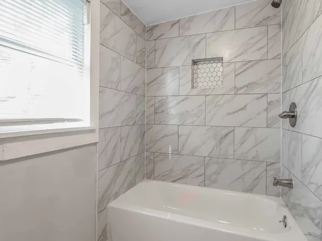 a bathroom with a bathtub