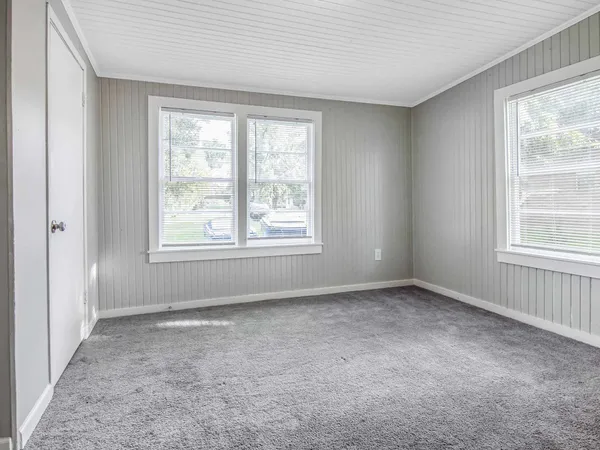 an empty room with windows