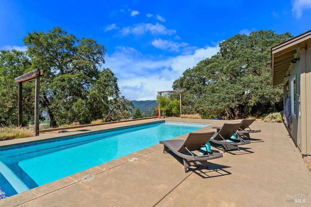 31000 Pine Mountain Road Cloverdale, CA 95425 - Photo 52 of 82 Resort-style pool living enhances the property's relaxed countryside lifestyle.
