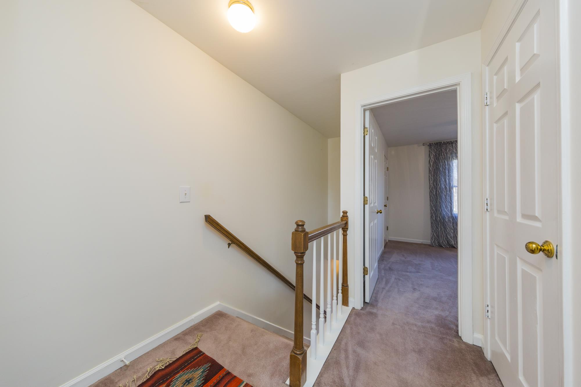765 Kent Road, Unit 765 Nashville, TN 37214 - Photo 16 of 30 a view of a hallway with wooden floor