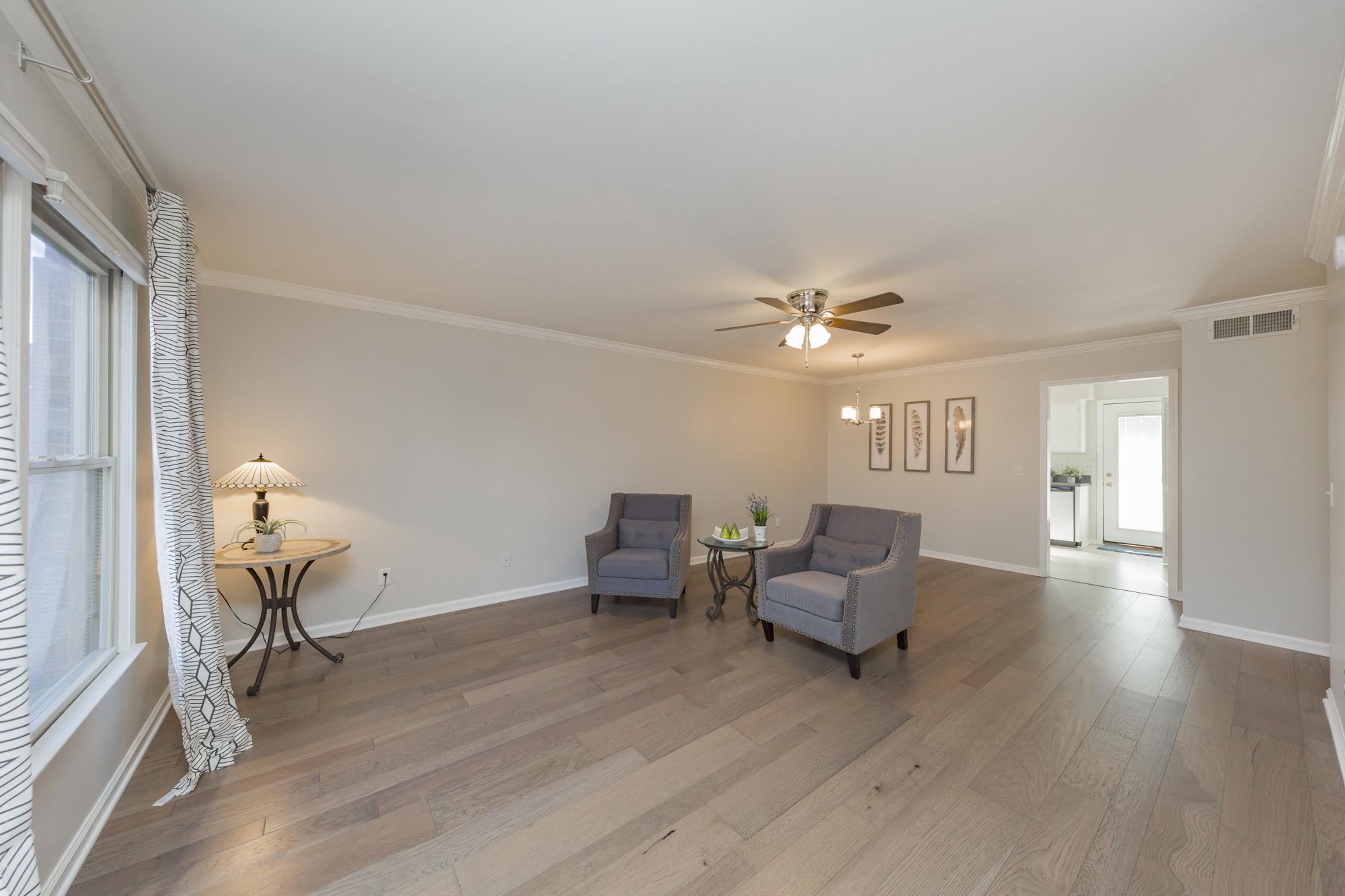 765 Kent Road, Unit 765 Nashville, TN 37214 - Photo 3 of 30 a living room with furniture and a wooden floor