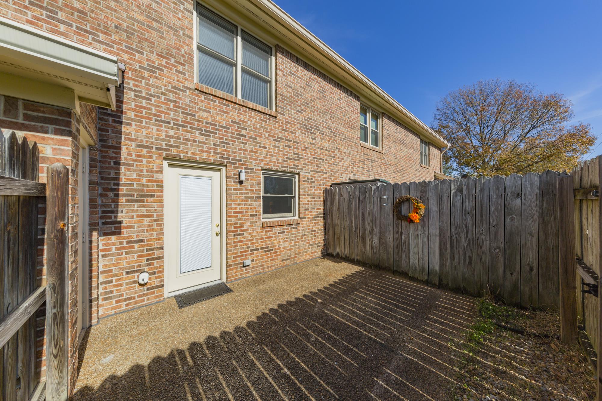 765 Kent Road, Unit 765 Nashville, TN 37214 - Photo 27 of 30 a view of a house with wooden fence