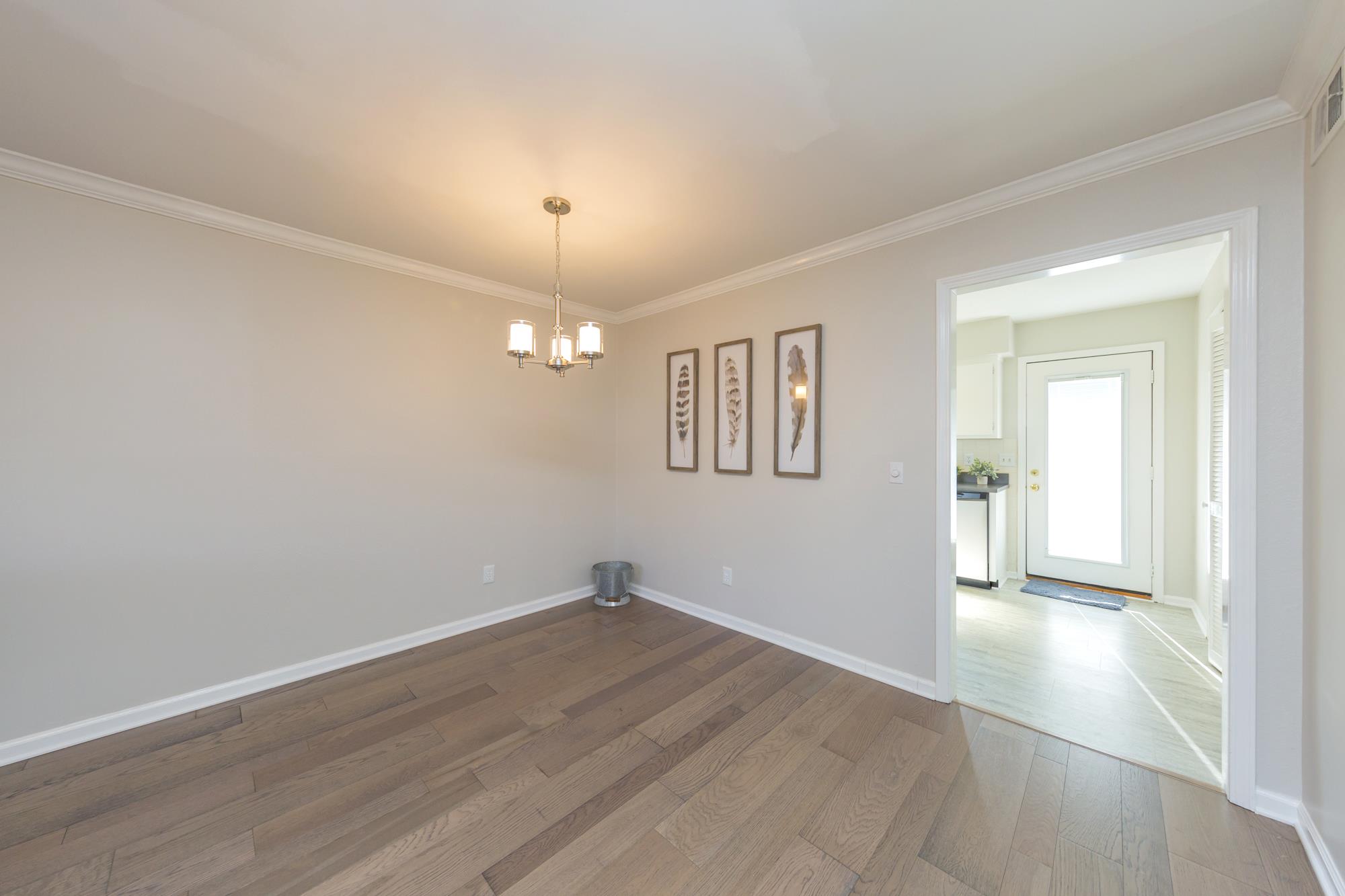765 Kent Road, Unit 765 Nashville, TN 37214 - Photo 6 of 30 wooden floor in an empty room with a window