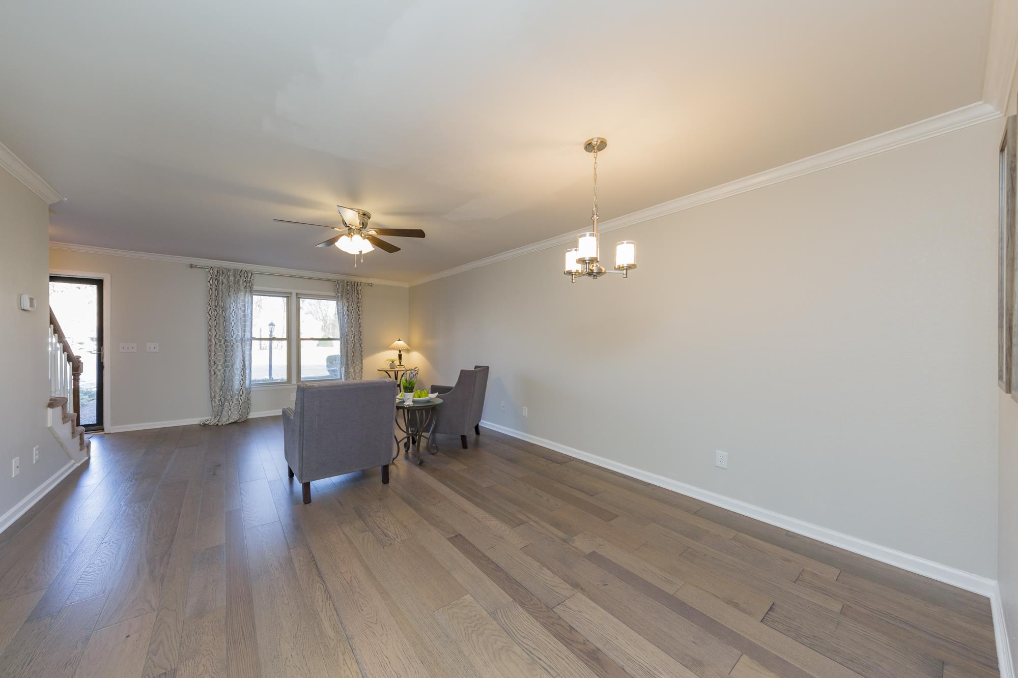 765 Kent Road, Unit 765 Nashville, TN 37214 - Photo 9 of 30 a view of livingroom with furniture wooden floor and fan