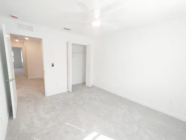 a kitchen with stainless steel appliances a refrigerator stove microwave and sink